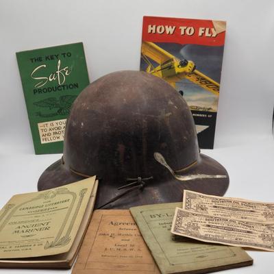 LOT 602: Antique Miner's Helmet, 1945 William Piper Flight Manuel, Philadelphia Navy Yard Safety Handbook, Profit sharing Redemption...