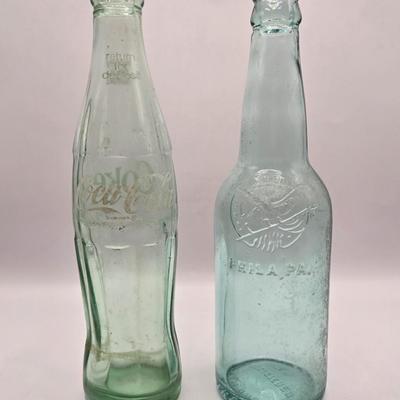 LOT 603: Have a Coke and a Smile; Vintage Coca Cola Rulers, Pencils, Bottles, Train Car Carrier, Bottle Opener, & Box of Ajax Bottlecaps