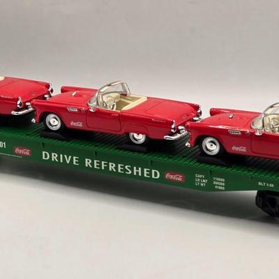 LOT 603: Have a Coke and a Smile; Vintage Coca Cola Rulers, Pencils, Bottles, Train Car Carrier, Bottle Opener, & Box of Ajax Bottlecaps