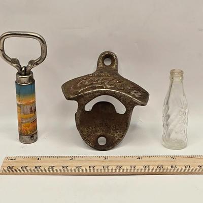 LOT 603: Have a Coke and a Smile; Vintage Coca Cola Rulers, Pencils, Bottles, Train Car Carrier, Bottle Opener, & Box of Ajax Bottlecaps