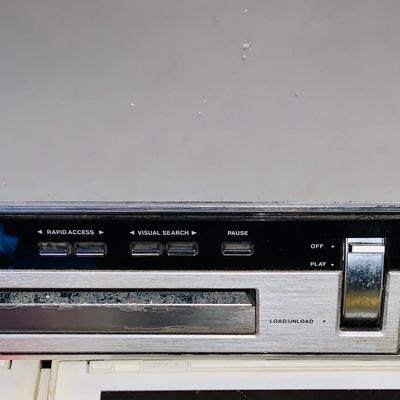LOT 611: Vintage Laser Disc Technology - RCA SelectaVision Stereo Video Disc Player Model SGT 200 with a Large Assortment of Laser Discs...