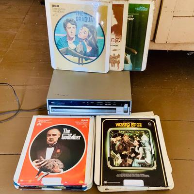 LOT 611: Vintage Laser Disc Technology - RCA SelectaVision Stereo Video Disc Player Model SGT 200 with a Large Assortment of Laser Discs...
