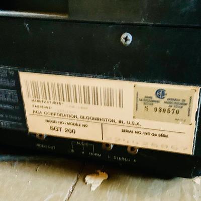 LOT 611: Vintage Laser Disc Technology - RCA SelectaVision Stereo Video Disc Player Model SGT 200 with a Large Assortment of Laser Discs...