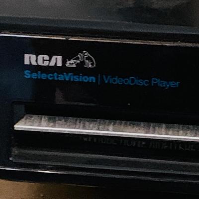 LOT612: Vintage Laser Disc Technology - RCA Selecta Vision Model SGT-200 with a Large Selection of Sci-Fi/ Horror Laser Disc Including...