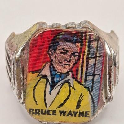 LOT 616: Chinese Cricket Box, "Lost World Watches", Small Pennant Flags, Marbles, Bruce Wayne Ring, Rulers, Wooden Box,& More