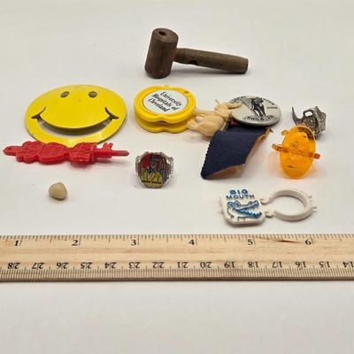 LOT 616: Chinese Cricket Box, "Lost World Watches", Small Pennant Flags, Marbles, Bruce Wayne Ring, Rulers, Wooden Box,& More