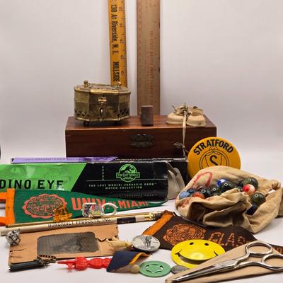 LOT 616: Chinese Cricket Box, "Lost World Watches", Small Pennant Flags, Marbles, Bruce Wayne Ring, Rulers, Wooden Box,& More