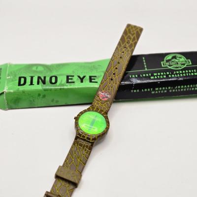 LOT 616: Chinese Cricket Box, "Lost World Watches", Small Pennant Flags, Marbles, Bruce Wayne Ring, Rulers, Wooden Box,& More