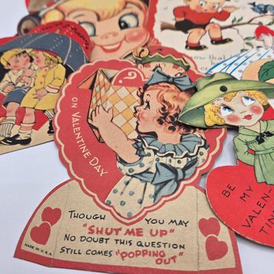 LOT 619: Various Postcards, Greeting Cards, Comic Strips, Matches, Stamps, & Coin Trick Block Puzzle Instructions