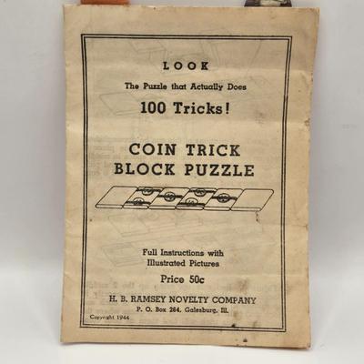 LOT 619: Various Postcards, Greeting Cards, Comic Strips, Matches, Stamps, & Coin Trick Block Puzzle Instructions