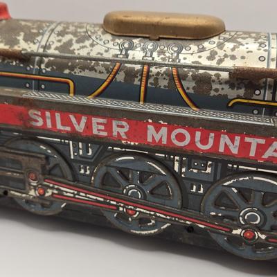 LOT 622: Vintage Tin Litho Silver Mountain Toy Train
