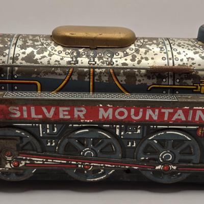 LOT 622: Vintage Tin Litho Silver Mountain Toy Train