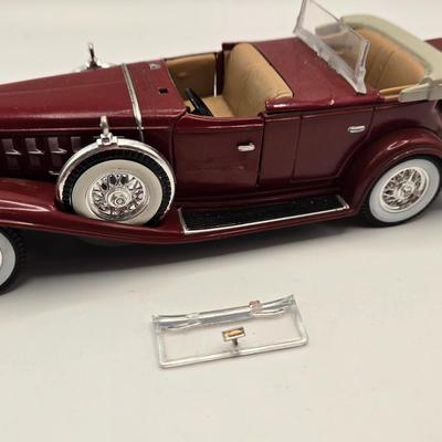 LOT 623: Honda Repair Guide Book, 1976 Cadillac Owner's Manuel, Various Die Cast Metal Cars, Morris Garages Car Logo Patches,...