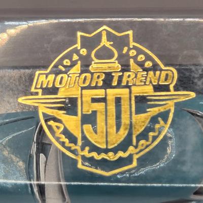 LOT 623: Honda Repair Guide Book, 1976 Cadillac Owner's Manuel, Various Die Cast Metal Cars, Morris Garages Car Logo Patches,...