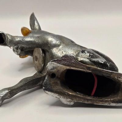 LOT 625: Vintage Metal Donkey Hood Ornament with Illuminated Amber Eyes