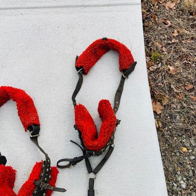 LOT 629: Assortment of Horse Tack Including Bits, Reins and More and a Leather Saddle Bag