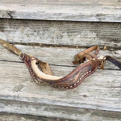 LOT 630: Assortment of Horse Tack Including Bits, Reins and More and a Leather Saddle Bag