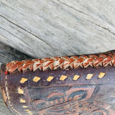 LOT 630: Assortment of Horse Tack Including Bits, Reins and More and a Leather Saddle Bag