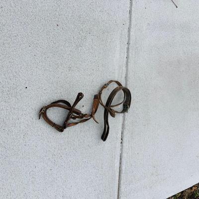 LOT 630: Assortment of Horse Tack Including Bits, Reins and More and a Leather Saddle Bag