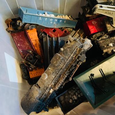 LOT 635: Bin of Vintage O Scale Miniature Trains and Fall Accessories