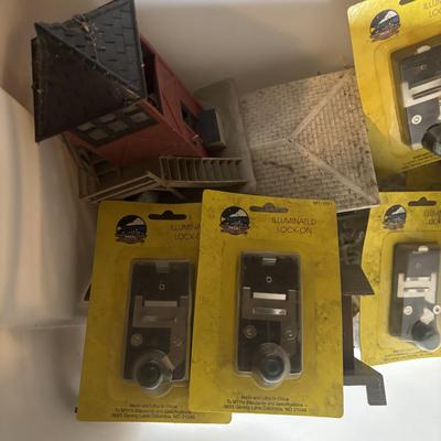 LOT 646: As Found Bin of Train Accessories: Houses, Fences etc.