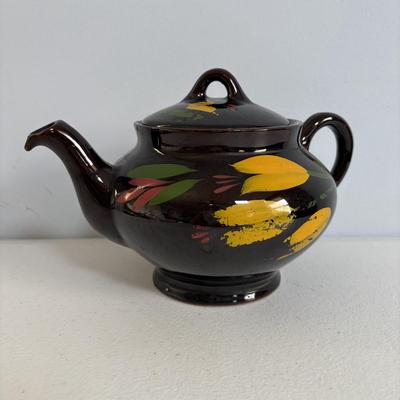 LOT 656: Vintage Amber Glass Jeannette Dish, Royal Canadian Art Pottery Tea Pot, Wooden Mortar & Pestel, Portugal. Olive Green Eagle...