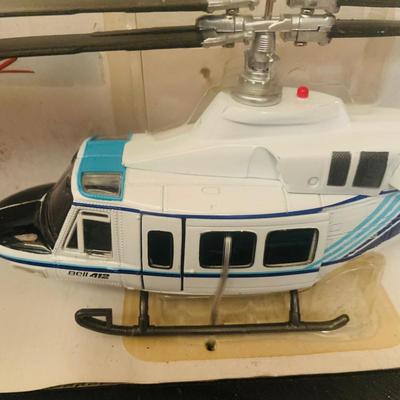 LOT 659: K-Line Aviation K40226 Army Air Corp P40 Fighter Plane and K-Line K-94701 Bell 412 Die Cast Helicopter