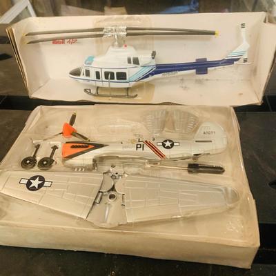 LOT 659: K-Line Aviation K40226 Army Air Corp P40 Fighter Plane and K-Line K-94701 Bell 412 Die Cast Helicopter