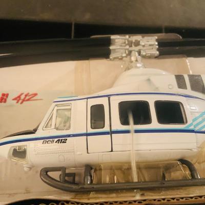 LOT 659: K-Line Aviation K40226 Army Air Corp P40 Fighter Plane and K-Line K-94701 Bell 412 Die Cast Helicopter