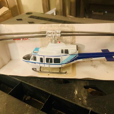 LOT 659: K-Line Aviation K40226 Army Air Corp P40 Fighter Plane and K-Line K-94701 Bell 412 Die Cast Helicopter