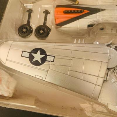 LOT 659: K-Line Aviation K40226 Army Air Corp P40 Fighter Plane and K-Line K-94701 Bell 412 Die Cast Helicopter