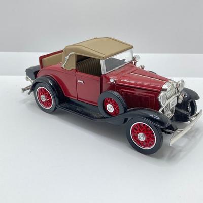 LOT 660: Vintage Automobile Collection - Die Cast Toy Cars (Chevrolet / Cord), Apco Japan Trivets and Randolph Chevrolet Ashtray