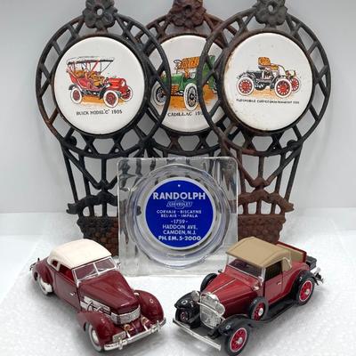 LOT 660: Vintage Automobile Collection - Die Cast Toy Cars (Chevrolet / Cord), Apco Japan Trivets and Randolph Chevrolet Ashtray