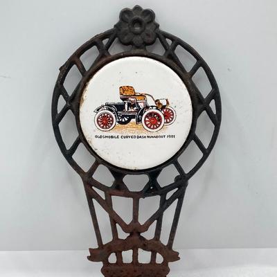 LOT 660: Vintage Automobile Collection - Die Cast Toy Cars (Chevrolet / Cord), Apco Japan Trivets and Randolph Chevrolet Ashtray