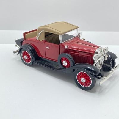 LOT 660: Vintage Automobile Collection - Die Cast Toy Cars (Chevrolet / Cord), Apco Japan Trivets and Randolph Chevrolet Ashtray