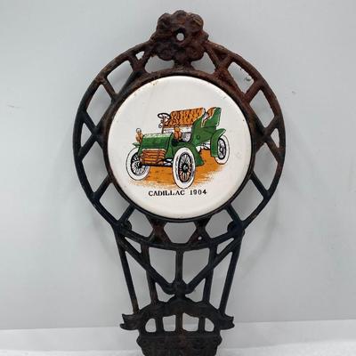 LOT 660: Vintage Automobile Collection - Die Cast Toy Cars (Chevrolet / Cord), Apco Japan Trivets and Randolph Chevrolet Ashtray