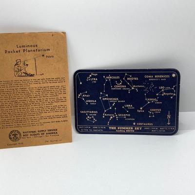 LOT 661: Boy Scout Collection - Books, Patches, Tokens, Hat, Philmont Belt and Luminous Pocket Planetarium