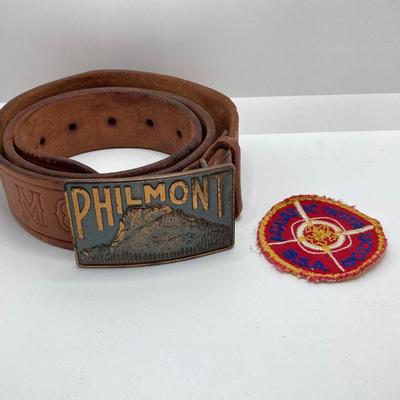 LOT 661: Boy Scout Collection - Books, Patches, Tokens, Hat, Philmont Belt and Luminous Pocket Planetarium