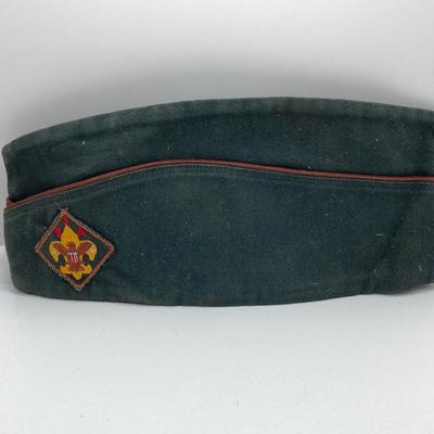 LOT 661: Boy Scout Collection - Books, Patches, Tokens, Hat, Philmont Belt and Luminous Pocket Planetarium