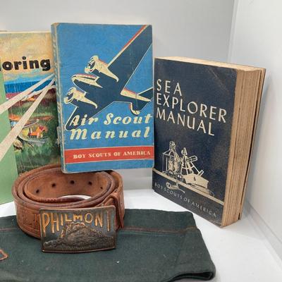 LOT 661: Boy Scout Collection - Books, Patches, Tokens, Hat, Philmont Belt and Luminous Pocket Planetarium