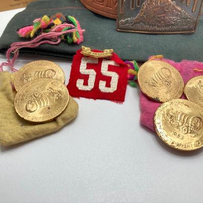 LOT 661: Boy Scout Collection - Books, Patches, Tokens, Hat, Philmont Belt and Luminous Pocket Planetarium