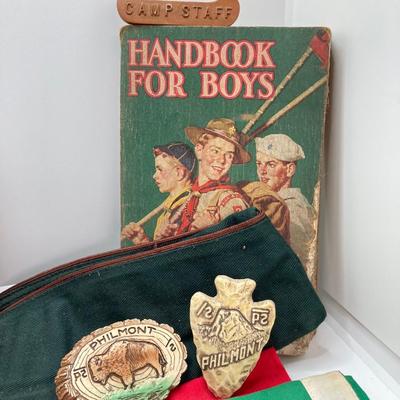 LOT 662: Collection of Vintage Boy Scout Memorabilia - Patches, Tokens, Hand Crafted Neckerchief Holders, Hat, Belt, Bandanas , Books and...