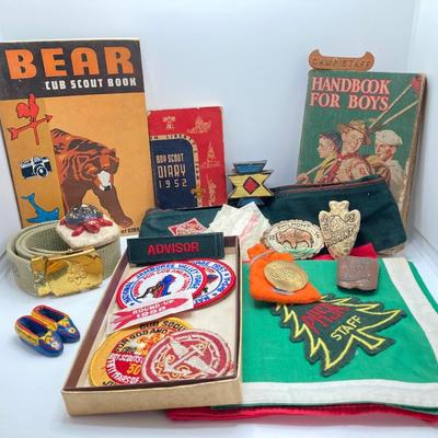 LOT 662: Collection of Vintage Boy Scout Memorabilia - Patches, Tokens, Hand Crafted Neckerchief Holders, Hat, Belt, Bandanas , Books and...