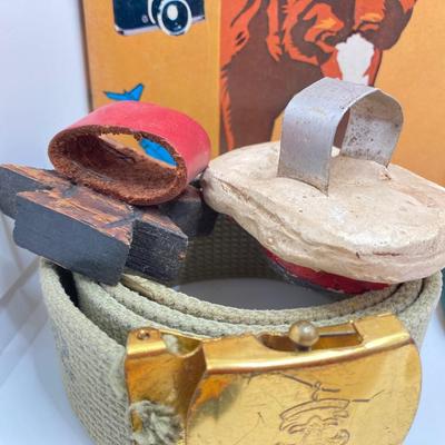 LOT 662: Collection of Vintage Boy Scout Memorabilia - Patches, Tokens, Hand Crafted Neckerchief Holders, Hat, Belt, Bandanas , Books and...