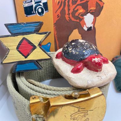 LOT 662: Collection of Vintage Boy Scout Memorabilia - Patches, Tokens, Hand Crafted Neckerchief Holders, Hat, Belt, Bandanas , Books and...