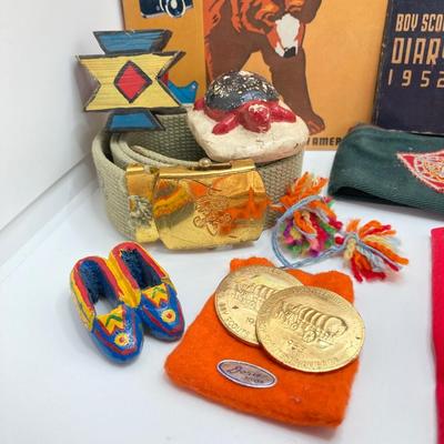 LOT 662: Collection of Vintage Boy Scout Memorabilia - Patches, Tokens, Hand Crafted Neckerchief Holders, Hat, Belt, Bandanas , Books and...