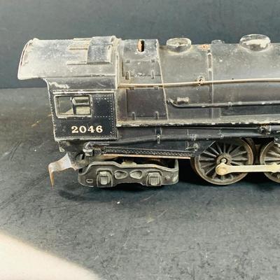 LOT 688: Lionel Post War 0/24 Scale Locomotive and Tinder - Pennsylvania RR Engine # 2048