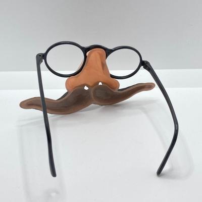 LOT 692: Vintage Paper Masks (Emerick's and More), Postcards, Toy Novelty Glasses with Nose and Mustache