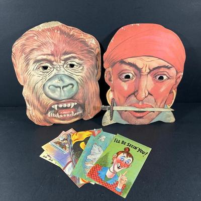 LOT 692: Vintage Paper Masks (Emerick's and More), Postcards, Toy Novelty Glasses with Nose and Mustache