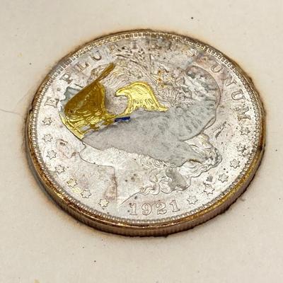 LOT 696: 1921 US Silver Morgan Dollar Coin with Decorative Award Stickers from Eagle Mothers